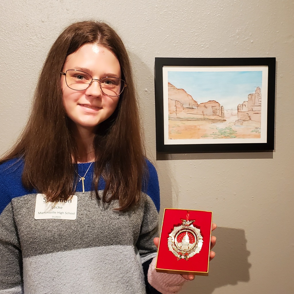 Shannon Locke with her entry and award for the  2022 Congressional Art Competition: a watercolor titled, “Memories of Sandstone.”