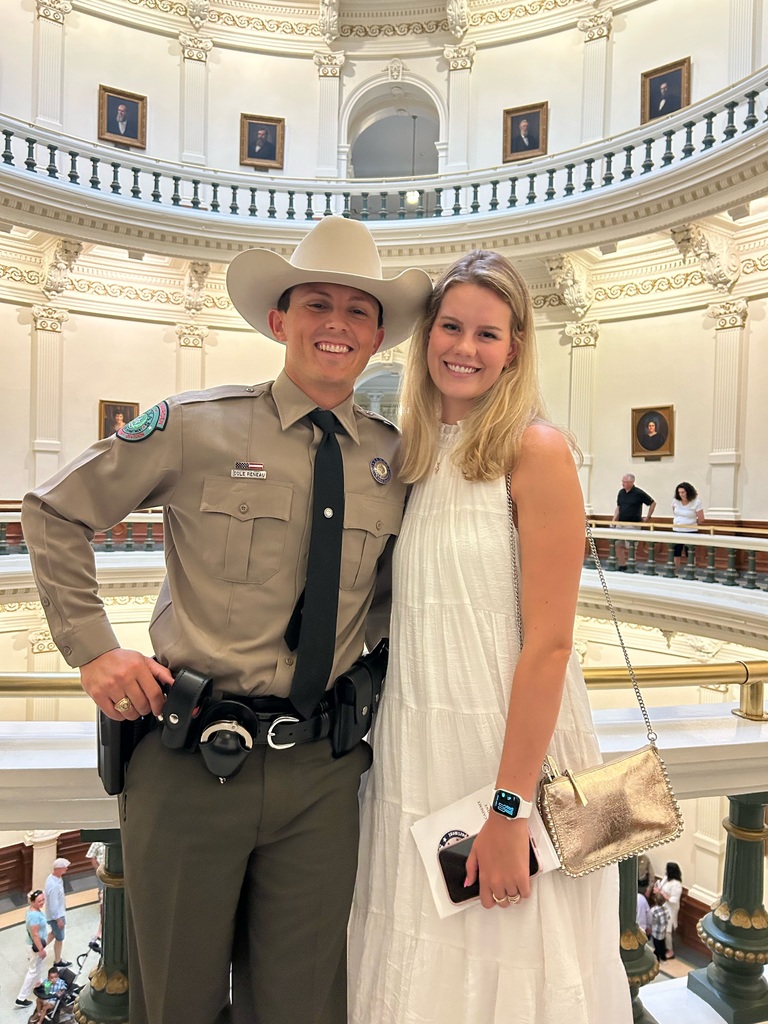 Photo of Claire and Cole Reneau in the rotunda of the Texas Capitol Building